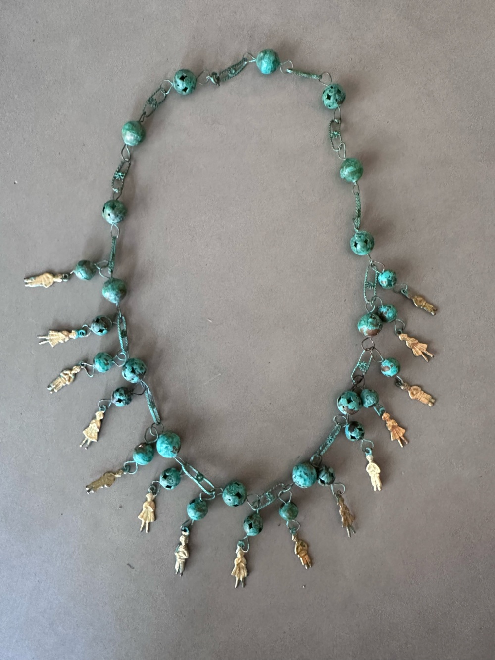 Turquoise Patina with Gold Tone Charms Necklace